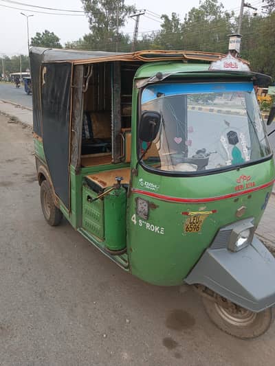 new asia green auto rickshaw