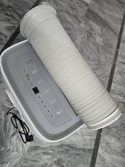 Portable AC Heat & Cool Brand New Condition, 1 week used for sale
