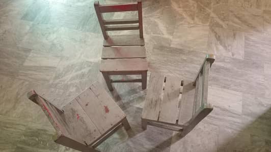 2 bed side tables and 3 kids chairs .