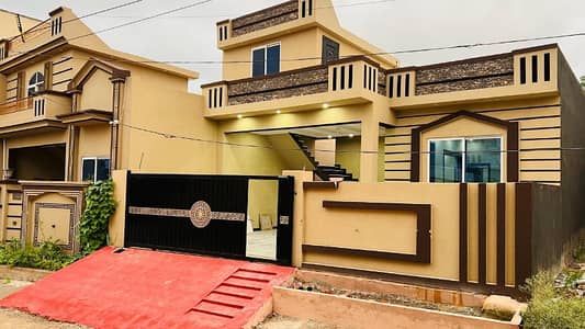 10 Marla Brand New House For sale   Basic facilities available  Near the Main Accesso  Water Bore installed