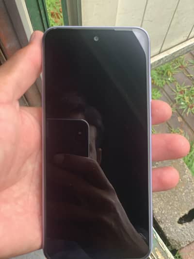 Infinix hot 50i 6+6 /128 ram rom daba charger all ok condition 10/10