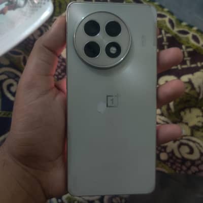 OnePlus 13r 12/256 with original charger.