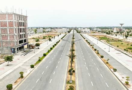 1 KANAL PLOT ON MAIN BOULEVARD WITH ALL DUES PAID AND READY FOR CONSTRUCTION AVAILABLE FOR SALE