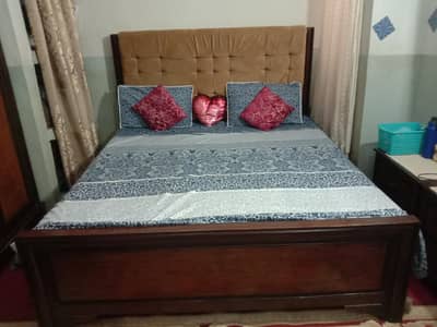 Pure wooden king size bed.
