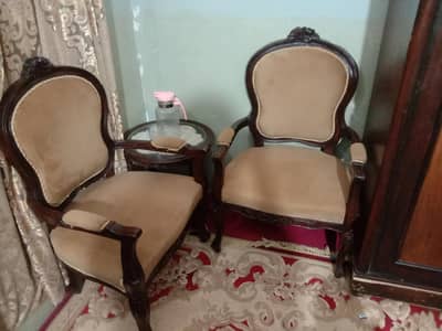 Pure wooden Chairs with round table.