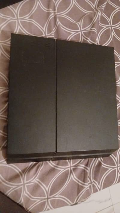 PlayStation 4 with 2 original controllers, 1 TB, Fat
