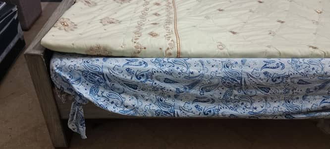 wooden double bed in beautiful color without mattress