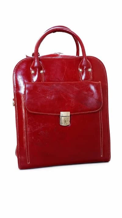 red leather McKlein La Grange vertical rolling laptop briefcase.