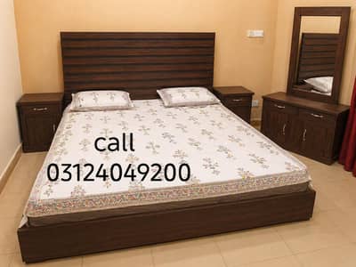 slightly used wooden bed set call 0312'4049200