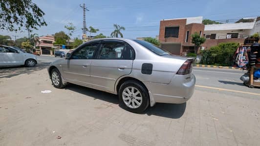Title: Honda Civic EXi 2004 | Excellent Condition | Family Used |