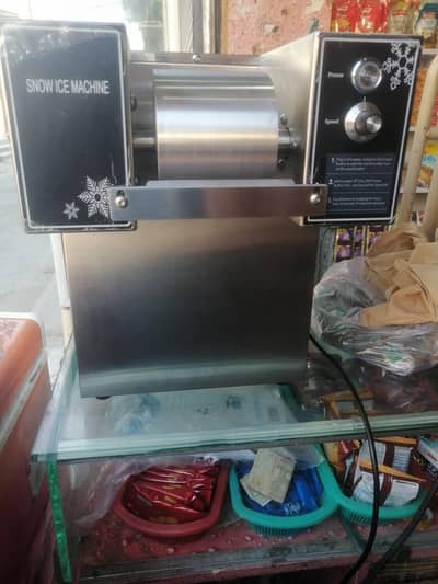 Snow flake ice machine