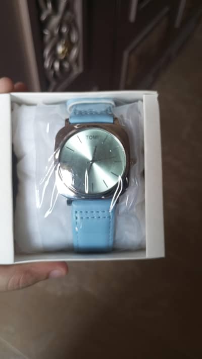 tomi watch