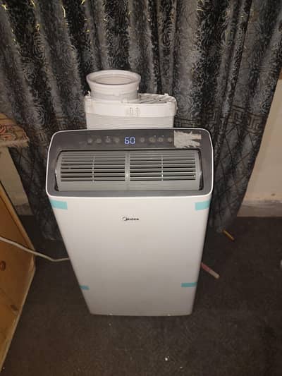 Midea Portable AC for Sale with Low Electricity Consumption. Almost new