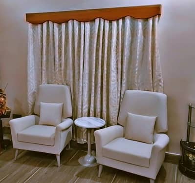 2 Sofa Chairs along with Marble Coffee Table