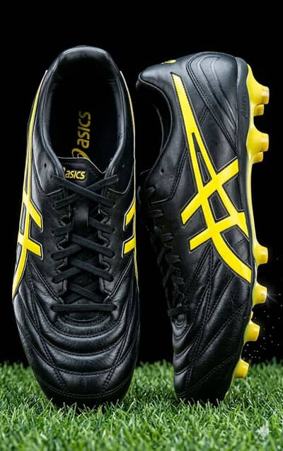 Asics branded Football shoes