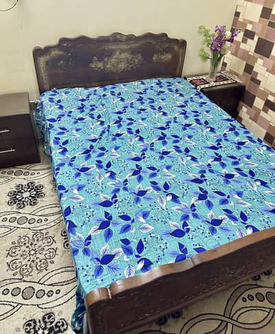 Queen bed with dressing and side table