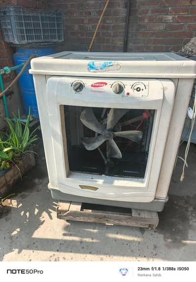used cooler. . everything working fine. . water motor, fan motor.