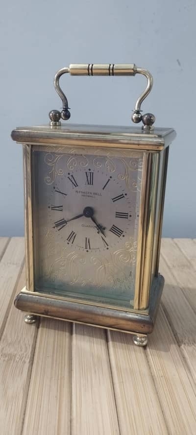 Quartz table clock in brass metal ( made in England)