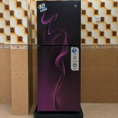 medium size purple pel refrigerator in excellent condition for sale.