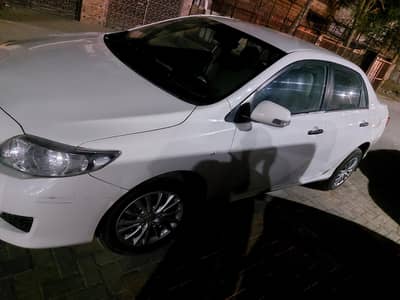 corolla gli 2009 in my name