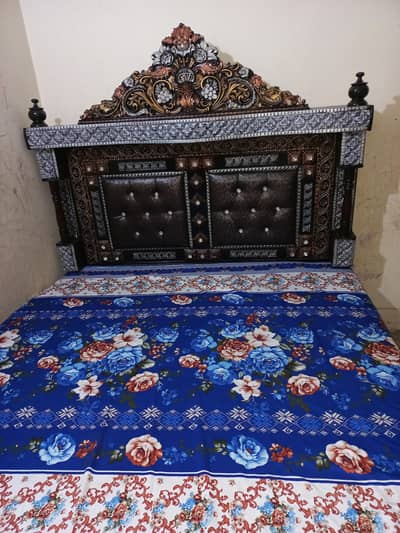Double bed with mattress alongwith sidetables and showcase
