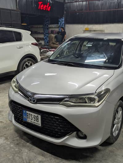 Toyota axio hybrid new lights top of the line