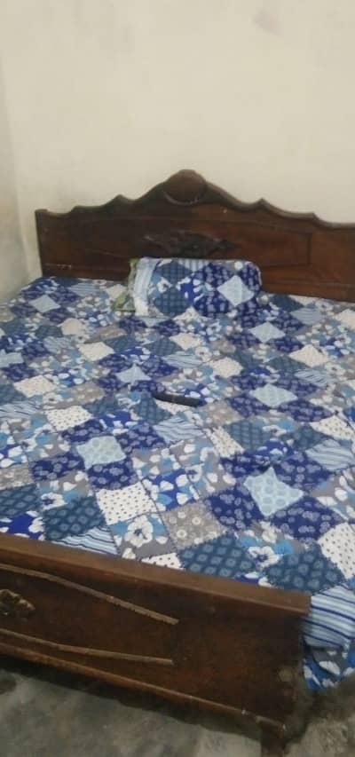 double bed with side racks and dressing