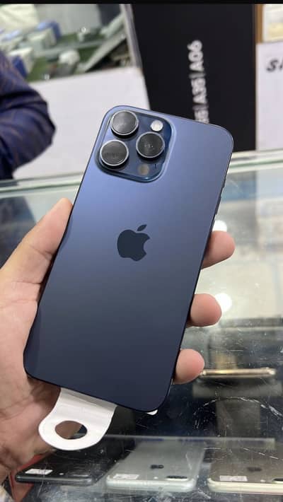 I phone 15 pro max JV blue titanium 93% health 295 cycle 256 gb.
