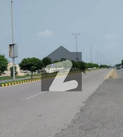 Facing Ring Road Plot No-2418 Block K - 10 Marla Plot On Top Location of Phase 9 Prism DHA Lahore For Urgent Sale