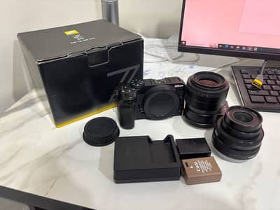 Z30 Nikon with kit-leans converter plus 35mm 1.8 with box