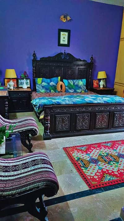 kind size bed along with side tables