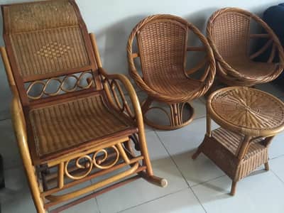 Rocking chair, revolving chairs and a coffee table for sale