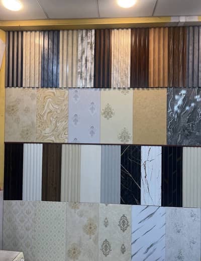 PVC Panels ,Wallpapers,UV Marble Sheets ,blinds,Wooden &Vinyl Flooring