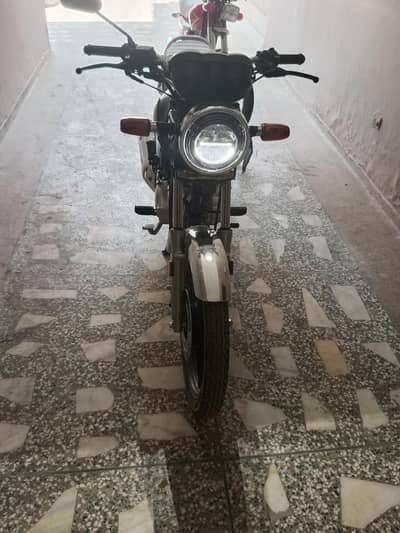 Honda cb150 only 209 km drive first owner Islamabad no complete file