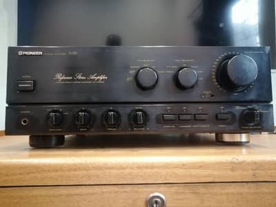 Amplifier pioneer stereo model A-757 and woofer  velodyne