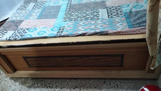 bed with one side table