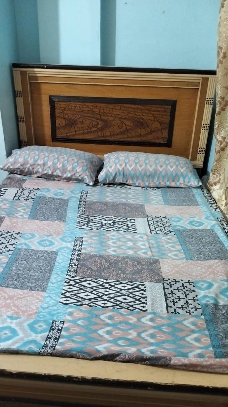 bed with one side table 3