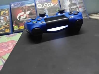 PS4 SLIM W CONTROLLER AND 2 GAMES