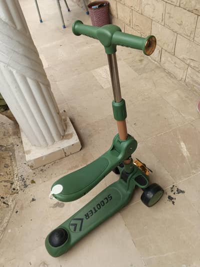 Kids scooter  . Brand new .