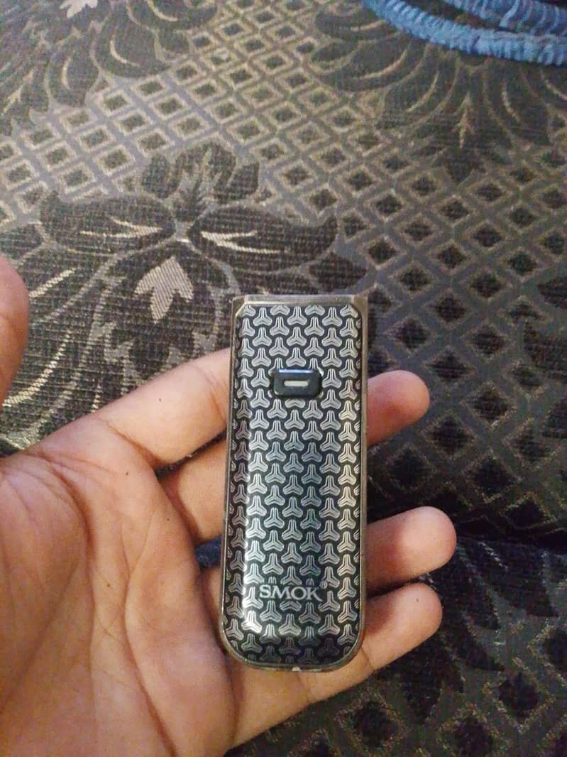 DESIGNED BY SMOK 0