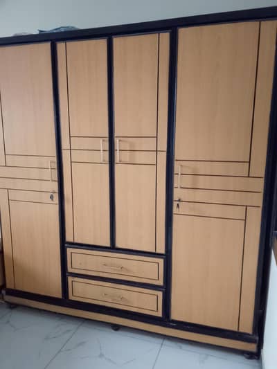 sale my home use three door folding partex cupboard