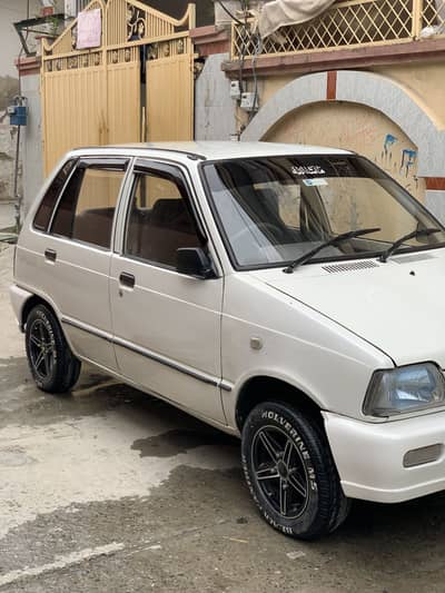 2009 model mehran white colour