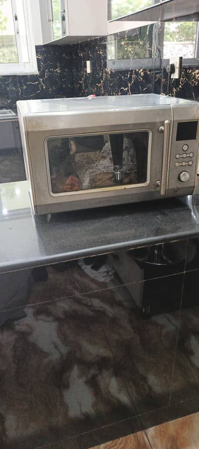 I m selling my microwave oven