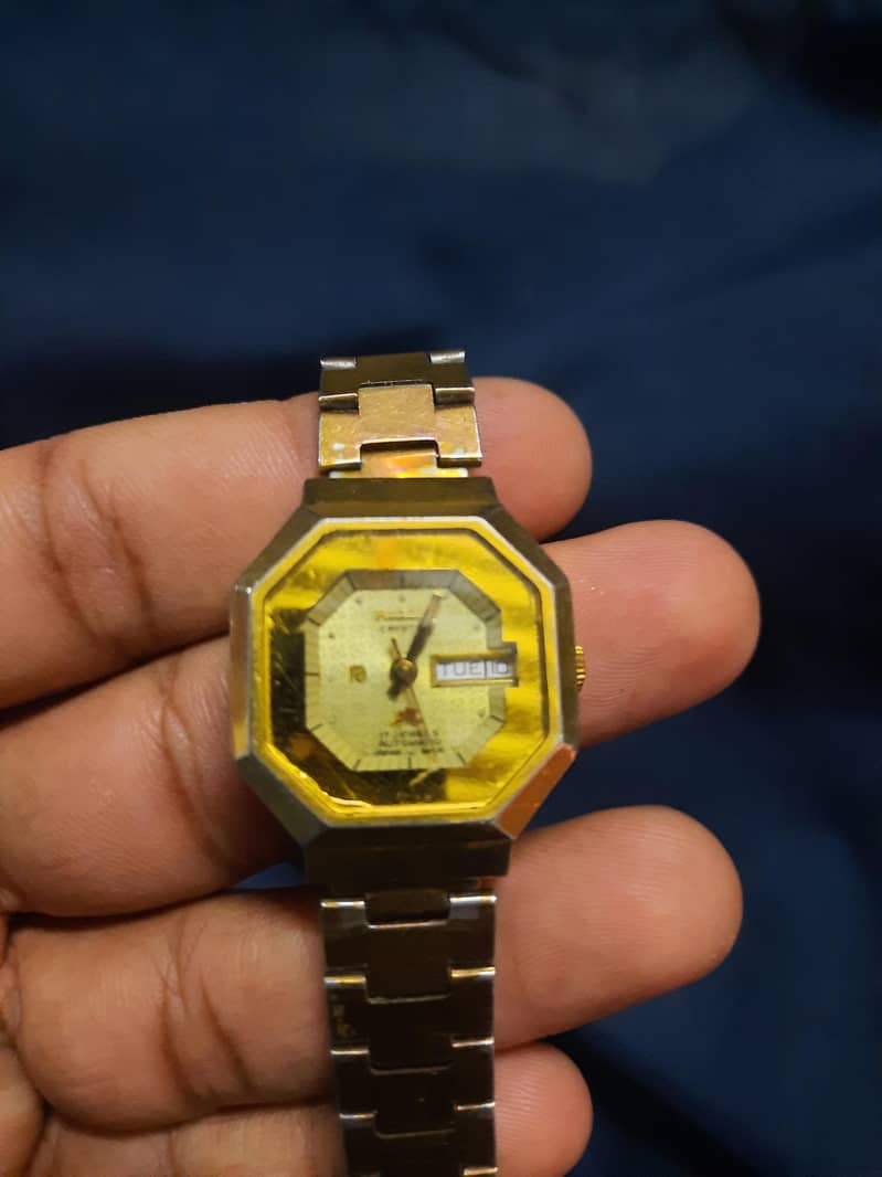 2 automatic watches 1
