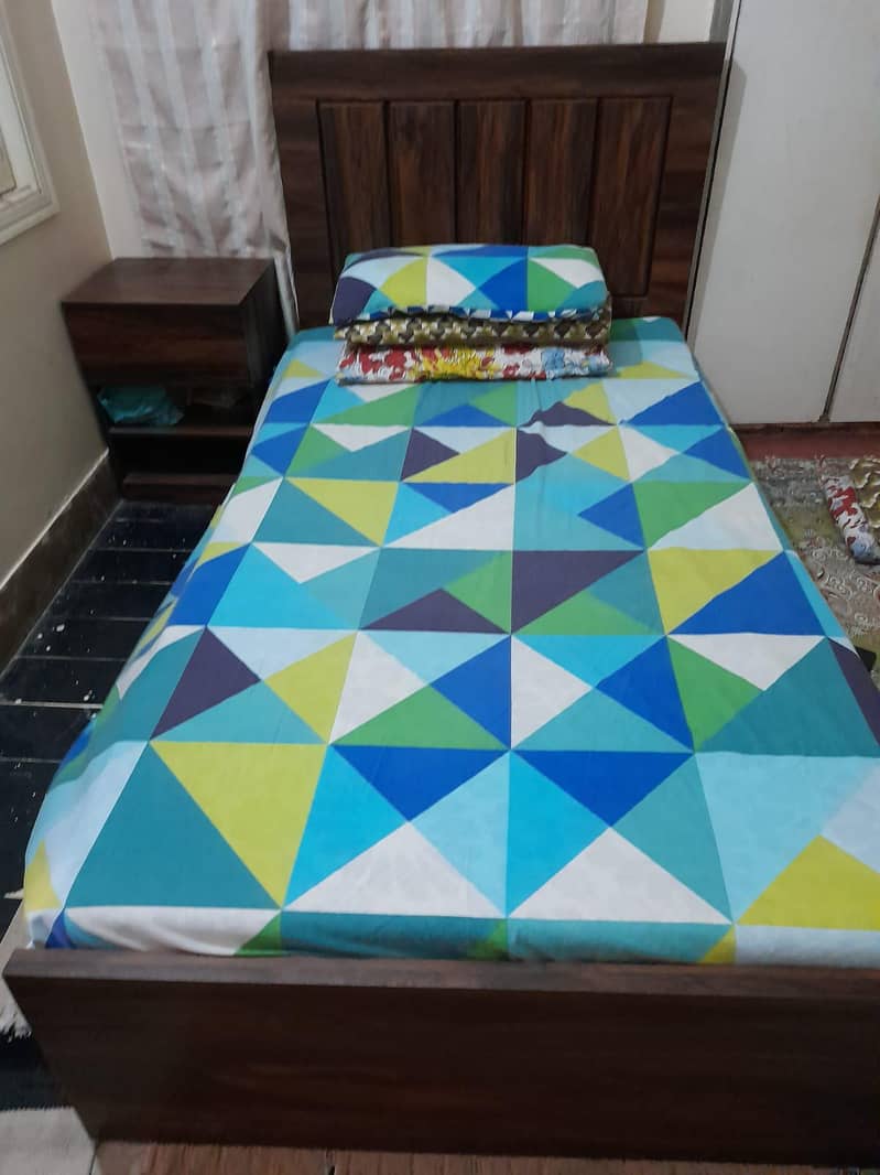 single bed with side table 1