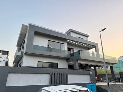 Triple Unit Luxury: Brand New 22-Marla Triple Story Mansion | Sector B, DHA 2
