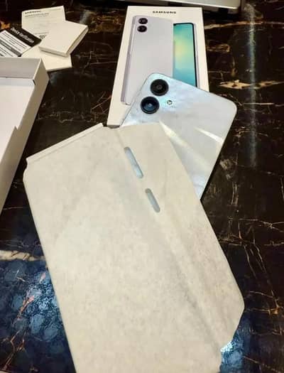 Brand new Samsung A06 with box charger and cover available