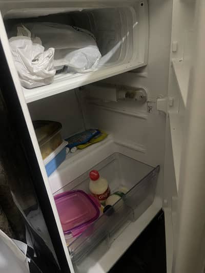 Mini fridge 31 * 21 * 19 inches , with freezer compartment