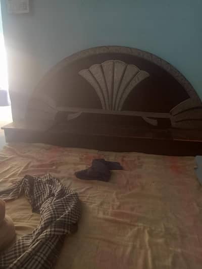 bed, sangar mirror and wardrobes of dishes
