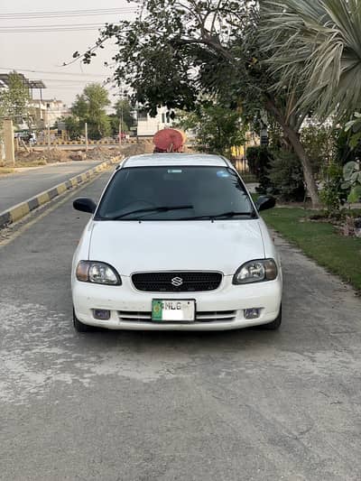 Suzuki baleno 2005 white colour Punjab number